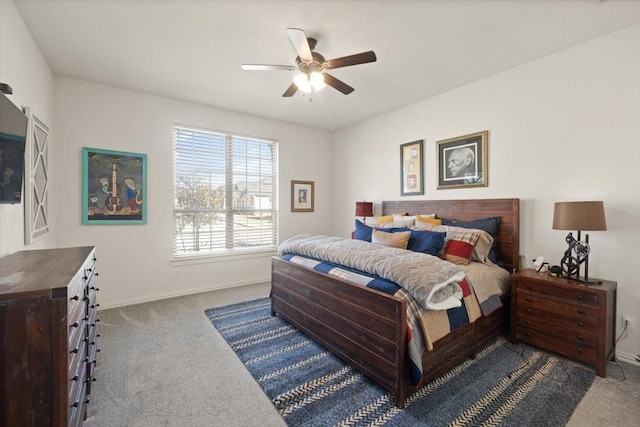 bedroom with ceiling fan and carpet flooring