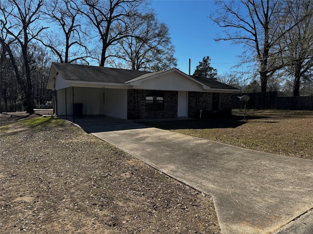 ranch-style home with a carport