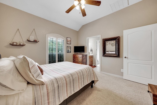 carpeted bedroom featuring vaulted ceiling and ceiling fan