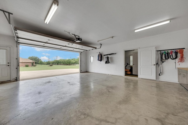 garage featuring a garage door opener