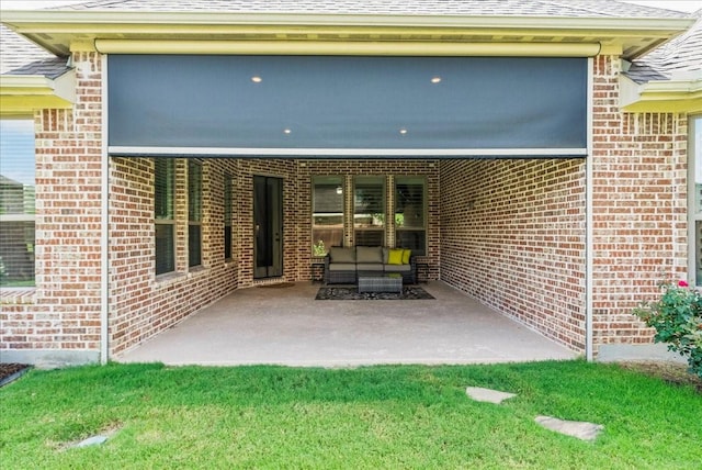 rear view of property with a patio area