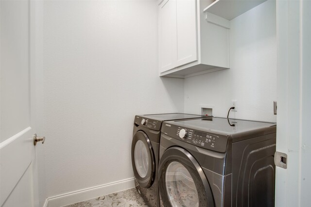 kitchen featuring range with two ovens, white cabinetry, gray cabinets, light hardwood / wood-style floors, and decorative backsplash