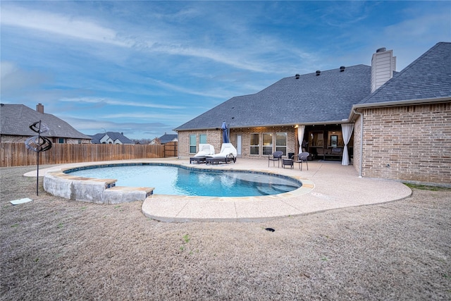 view of pool featuring a patio