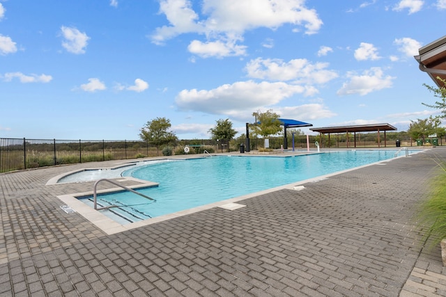 view of pool featuring a patio