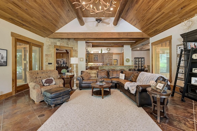 living room with wood ceiling, lofted ceiling with beams, french doors, and a chandelier