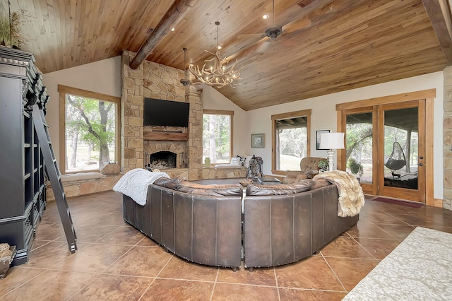 living room featuring tile patterned flooring, a stone fireplace, lofted ceiling with beams, and wooden ceiling