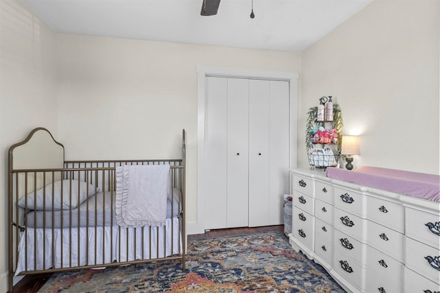 bedroom featuring ceiling fan and a closet