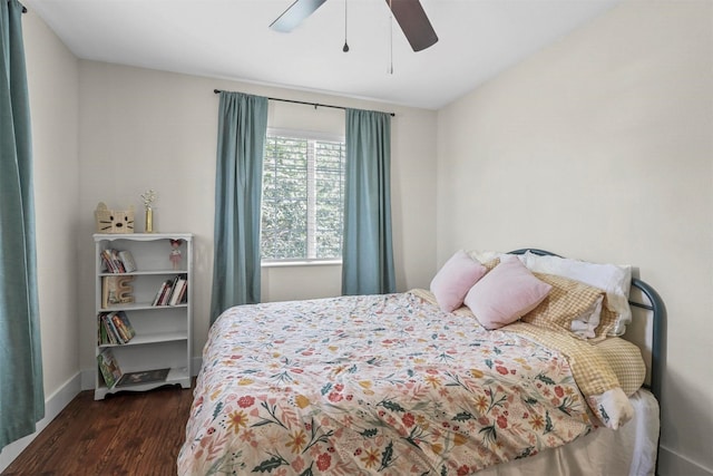 bedroom featuring dark hardwood / wood-style floors and ceiling fan