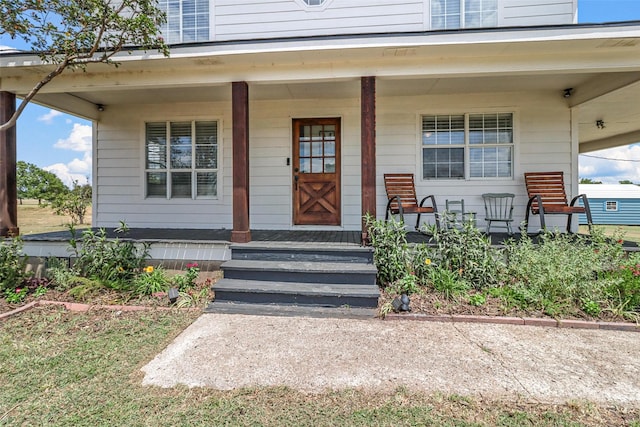 entrance to property with a porch