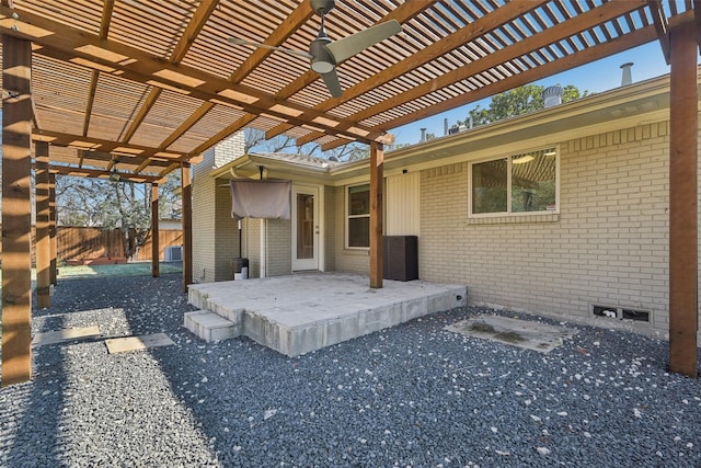 view of patio with cooling unit and a pergola