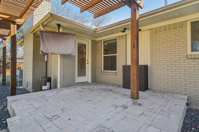 view of patio featuring a pergola