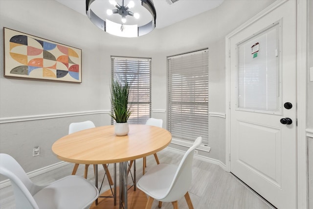 dining area with a chandelier