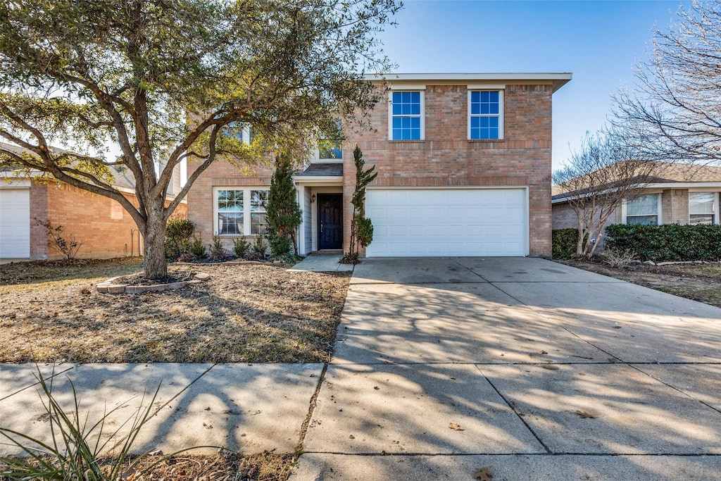 front of property featuring a garage