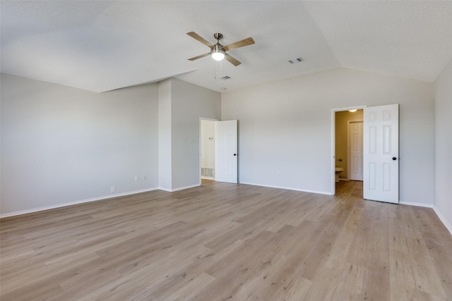 interior space featuring high vaulted ceiling, a textured ceiling, light hardwood / wood-style floors, and ceiling fan