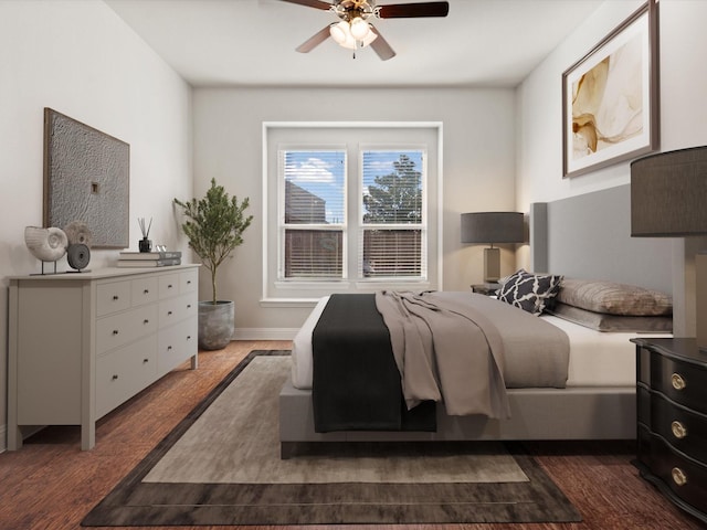 bedroom with baseboards, dark wood finished floors, and a ceiling fan