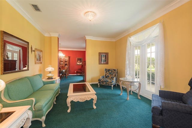 living area with crown molding, a chandelier, carpet floors, and baseboards