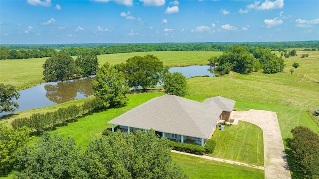 bird's eye view featuring a rural view and a water view