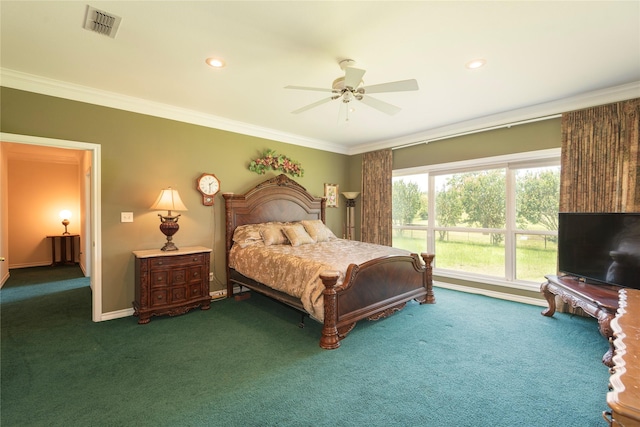 bedroom with ceiling fan, ornamental molding, and dark colored carpet