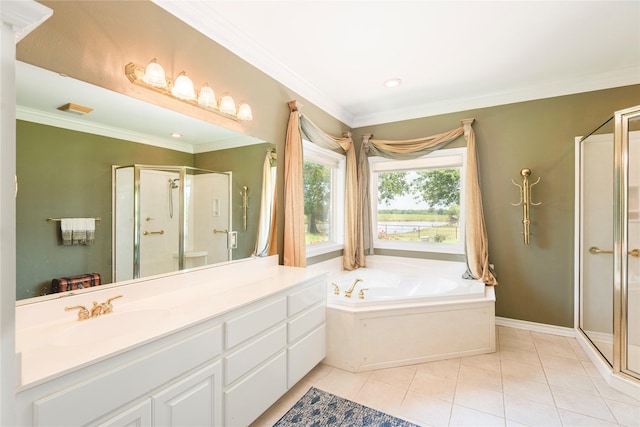 full bathroom featuring crown molding, tile patterned floors, a shower stall, a garden tub, and vanity
