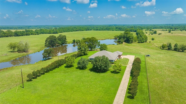 aerial view with a rural view and a water view