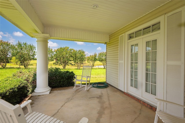 view of patio / terrace featuring french doors and a porch