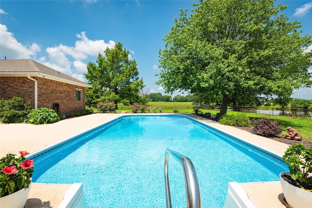 view of pool featuring a patio area