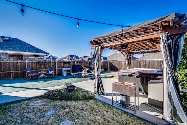 view of yard featuring a hot tub, a pergola, a fenced backyard, and a patio area