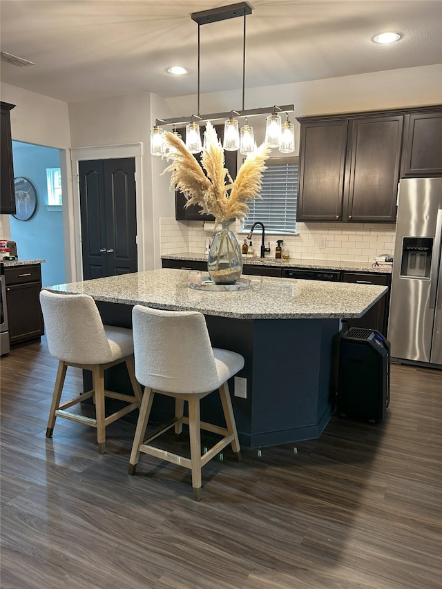 dining area featuring recessed lighting, dark wood finished floors, and visible vents
