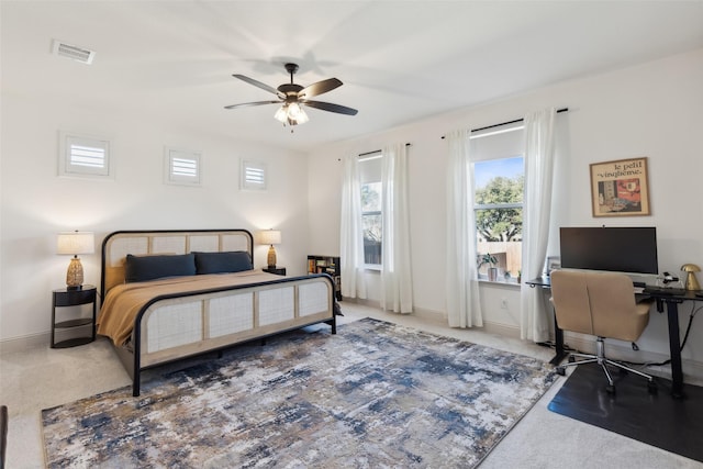 carpeted bedroom featuring ceiling fan