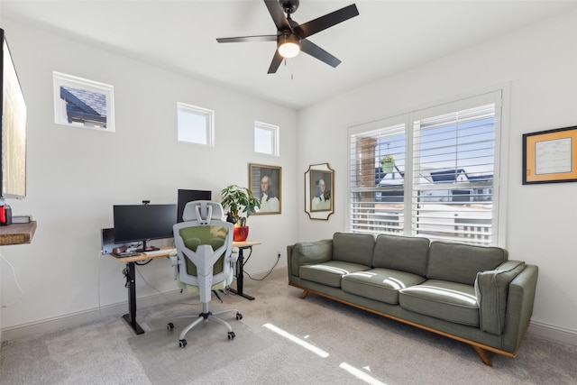 office space featuring carpet floors and ceiling fan