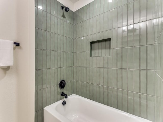 bathroom with shower / washtub combination