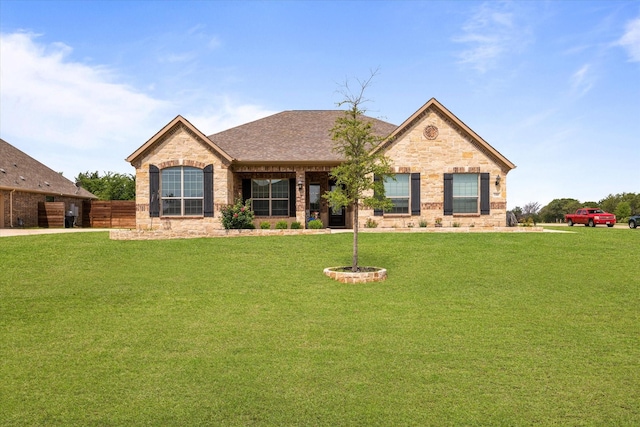 view of front facade with a front lawn