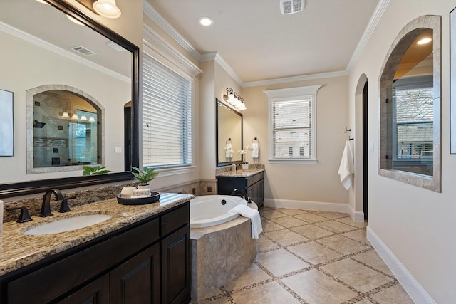 bathroom with crown molding, tiled shower, and vanity