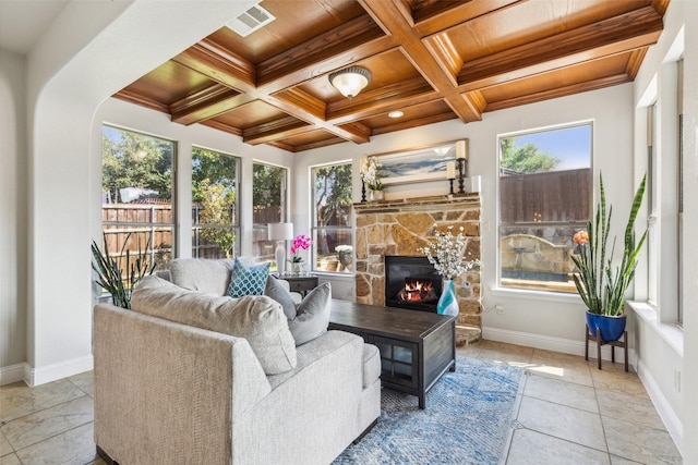 sunroom / solarium featuring coffered ceiling, a fireplace, wood ceiling, and beam ceiling