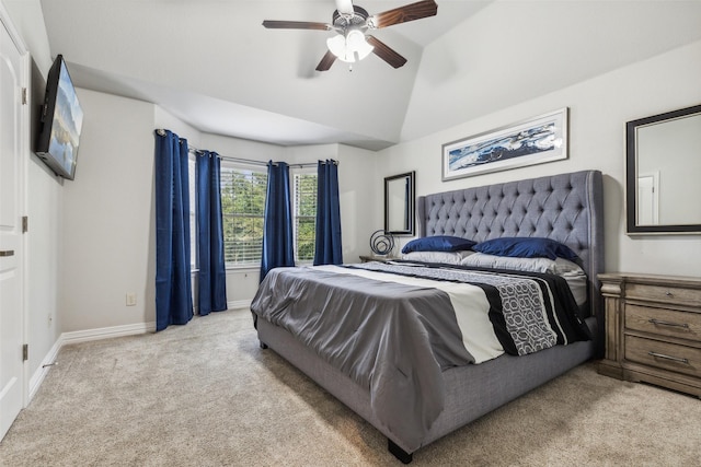 bedroom featuring lofted ceiling, light carpet, and ceiling fan