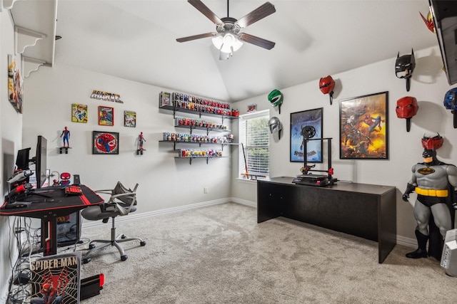 carpeted office space with ceiling fan and lofted ceiling