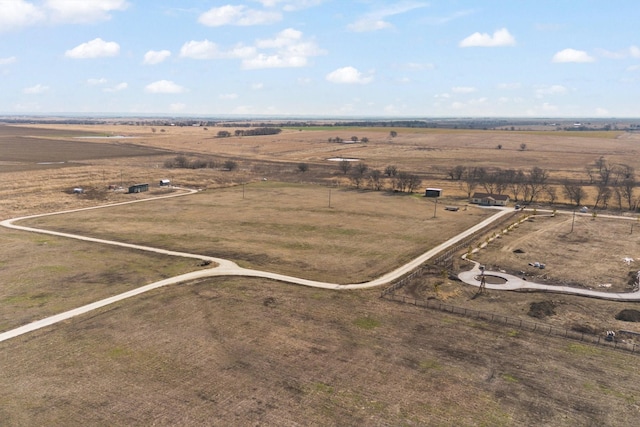 birds eye view of property featuring a rural view