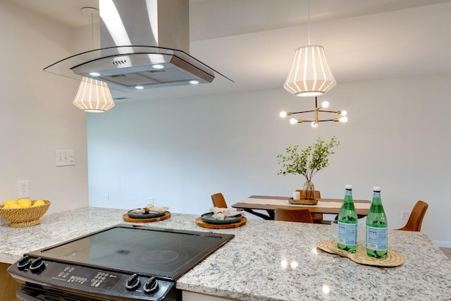 kitchen with an inviting chandelier, island range hood, decorative light fixtures, electric range, and light stone countertops