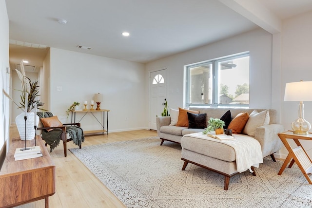 living room with light hardwood / wood-style floors