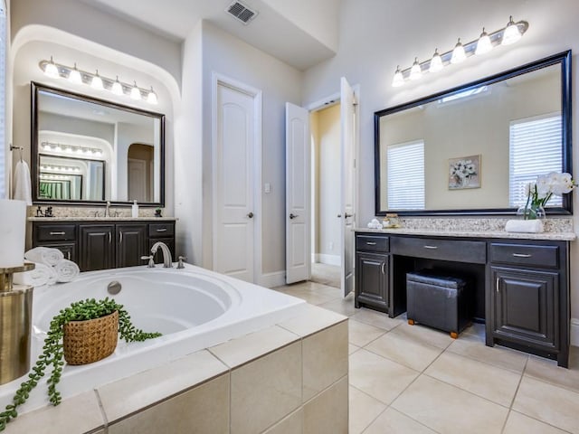 bathroom with vanity and tile patterned floors