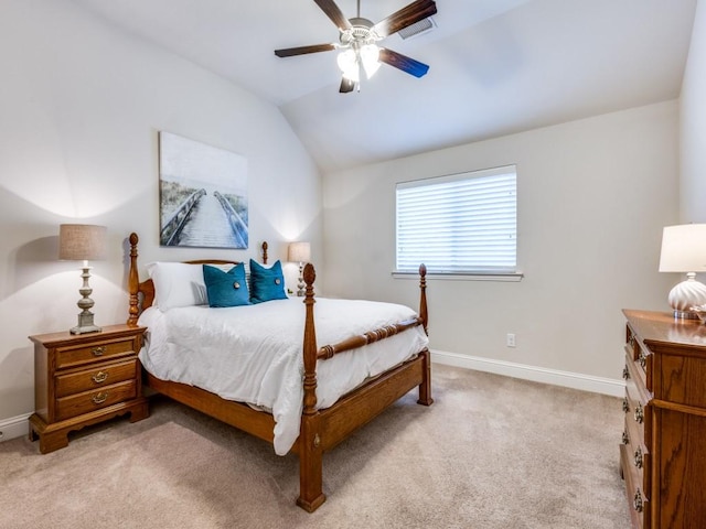 bedroom featuring ceiling fan, lofted ceiling, and light colored carpet