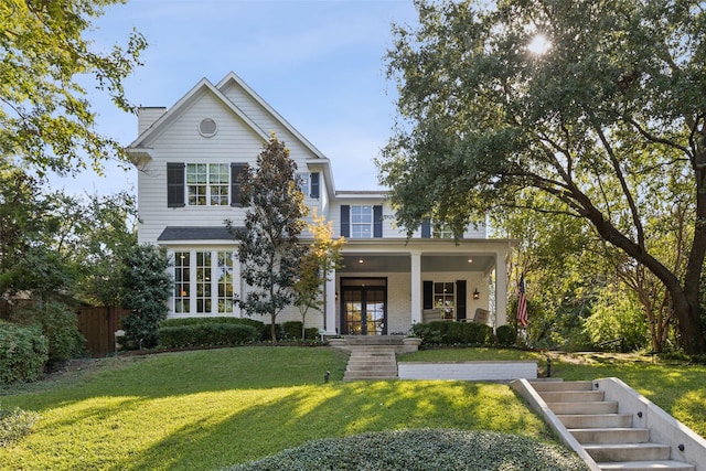 view of front of home with a front lawn