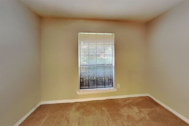5014 Brookhollow Dr, Sachse, TX 75048 - carpeted spare room with baseboards