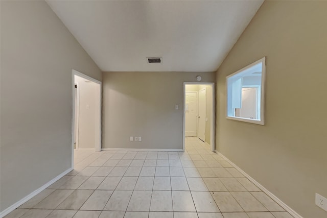 5014 Brookhollow Dr, Sachse, TX 75048 - unfurnished room with lofted ceiling, light tile patterned floors, and baseboards