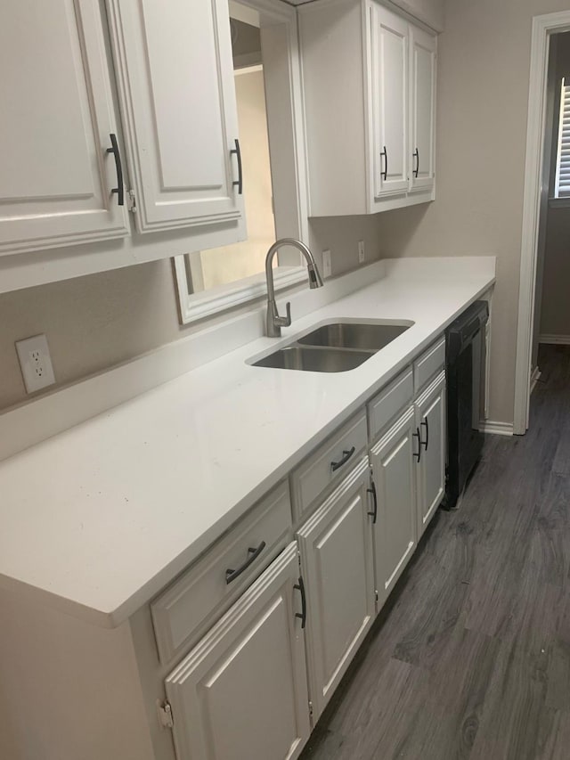 5014 Brookhollow Dr, Sachse, TX 75048 - kitchen with dishwasher, a sink, white cabinets, dark wood-style flooring, and light countertops