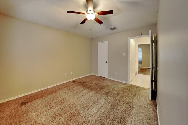 5014 Brookhollow Dr, Sachse, TX 75048 - unfurnished bedroom with carpet, baseboards, and a ceiling fan