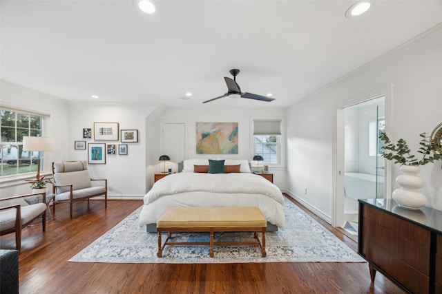 bedroom with crown molding, ceiling fan, dark hardwood / wood-style flooring, and multiple windows