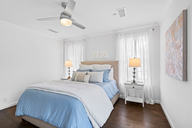 bedroom with multiple windows, dark wood-type flooring, ornamental molding, and ceiling fan