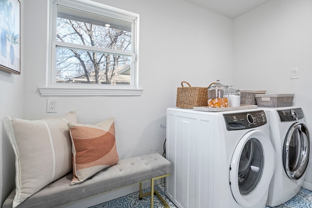 clothes washing area featuring washing machine and dryer