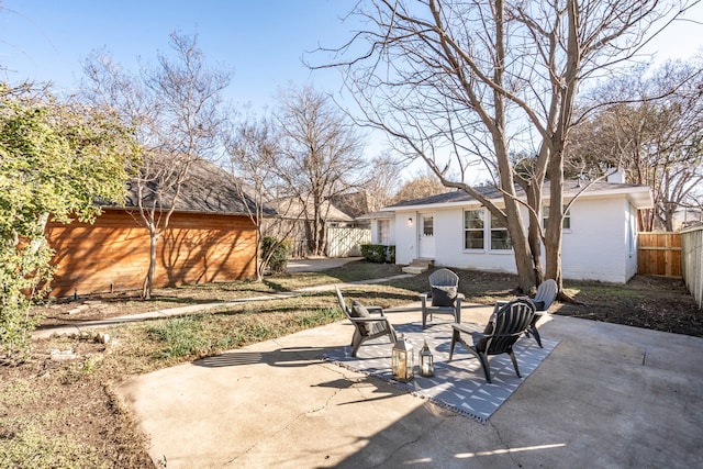 view of patio / terrace with a fire pit